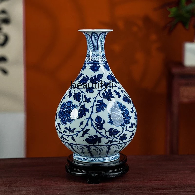 Ceramic vase hand-painted blue and white twisted branches peony jade pot spring vase living room entrance flower arrangement
Ceramic vase hand-painted blue and white twisted branches peony jade pot spring vase living room entrance flower arrangement
