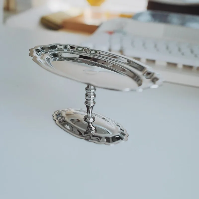 Ретро блюдо с фруктами на высоких ножках из нержавеющей стали, украшение для дома, настольное хранилище, поднос для ювелирных изделий, ресторан, сервировочная тарелка
Ретро блюдо с фруктами на высоких ножках из нержавеющей стали, украшение для дома, настольное хранилище, поднос для ювелирных изделий, ресторан, сервировочная тарелка