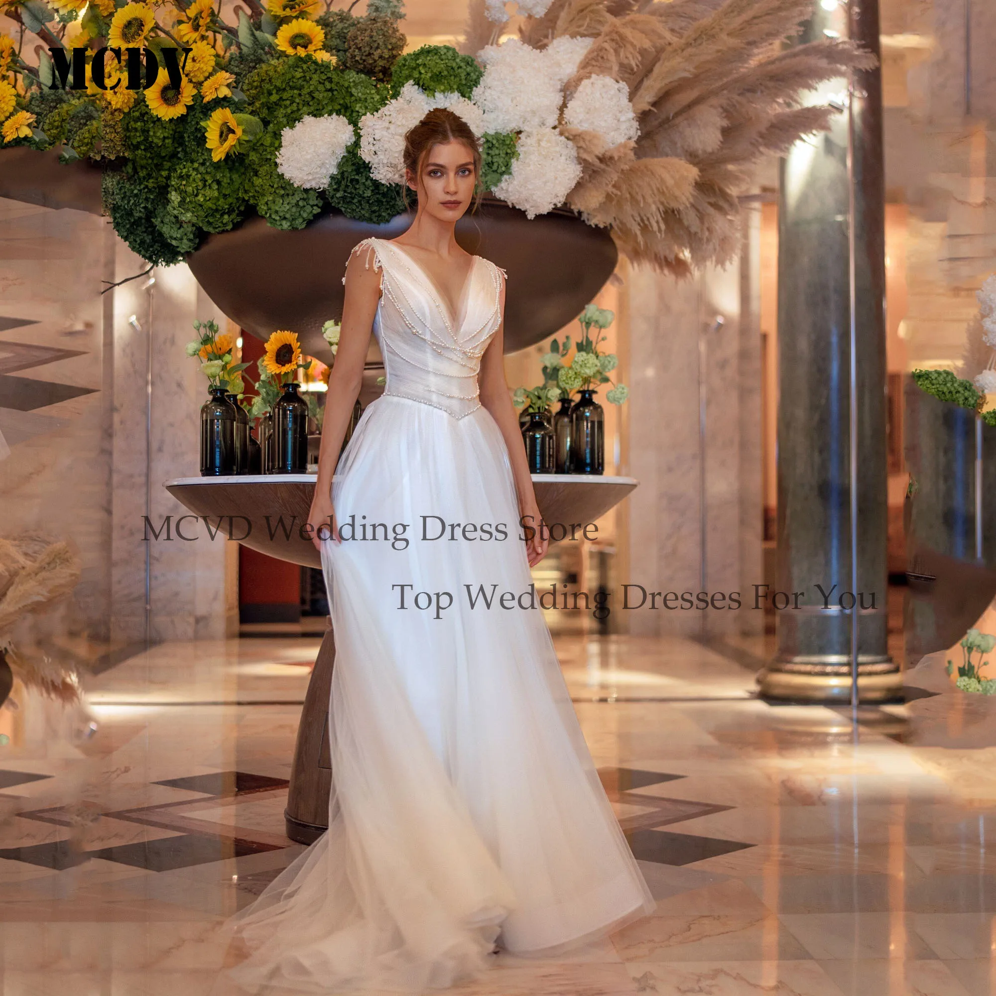 MCDV A-Line Beading Wedding Dress V-Line Backless Tulle Bride Dresses Elegant Bridal Dress vestidos de novia Customized 2025
MCDV A-Line Beading Wedding Dress V-Line Backless Tulle Bride Dresses Elegant Bridal Dress vestidos de novia Customized 2025