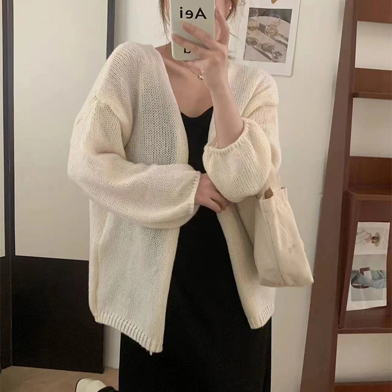 New Simple Solid Long Sleeve Knitted Cardigan Woman Autumn Korean Temperament Streetwear Coat Fashion All-Match Lightweight Tops
New Simple Solid Long Sleeve Knitted Cardigan Woman Autumn Korean Temperament Streetwear Coat Fashion All-Match Lightweight Tops