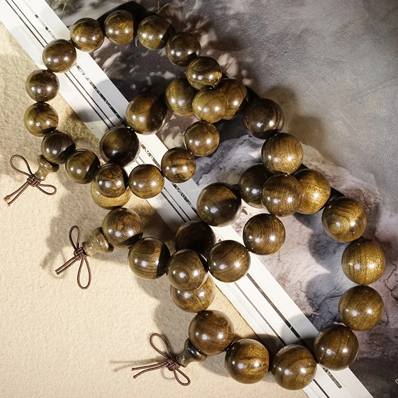 Water Wave Pattern Ebony Prayer Bead Bracelet Golden Phoebe Wood Beaded Wrist Jewelry for Men and Women Gifts
Water Wave Pattern Ebony Prayer Bead Bracelet Golden Phoebe Wood Beaded Wrist Jewelry for Men and Women Gifts