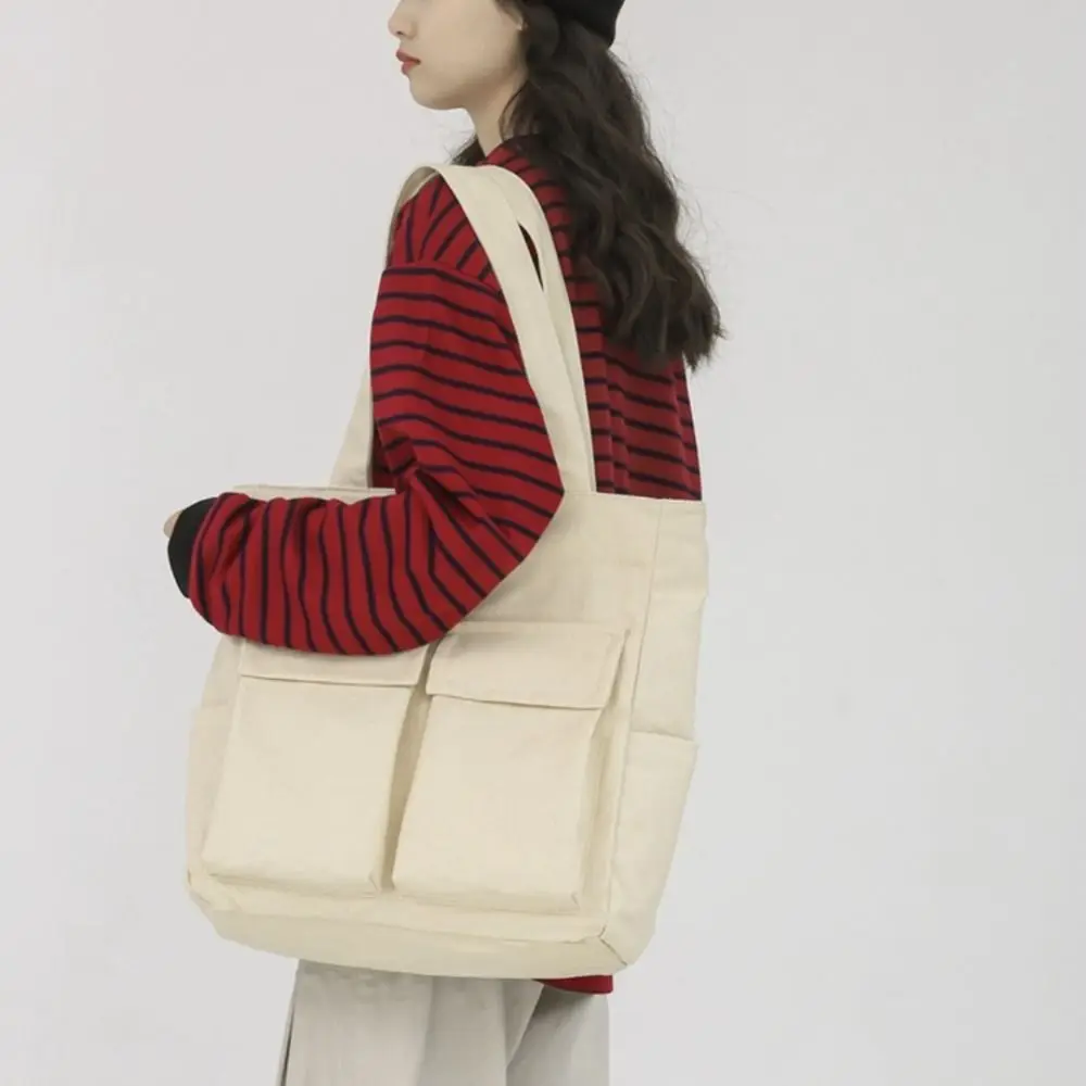 Модные сумки-тоут с множеством карманов, вместительные холщовые сумки через плечо, стильные легкие сумки-мессенджеры унисекс
Модные сумки-тоут с множеством карманов, вместительные холщовые сумки через плечо, стильные легкие сумки-мессенджеры унисекс