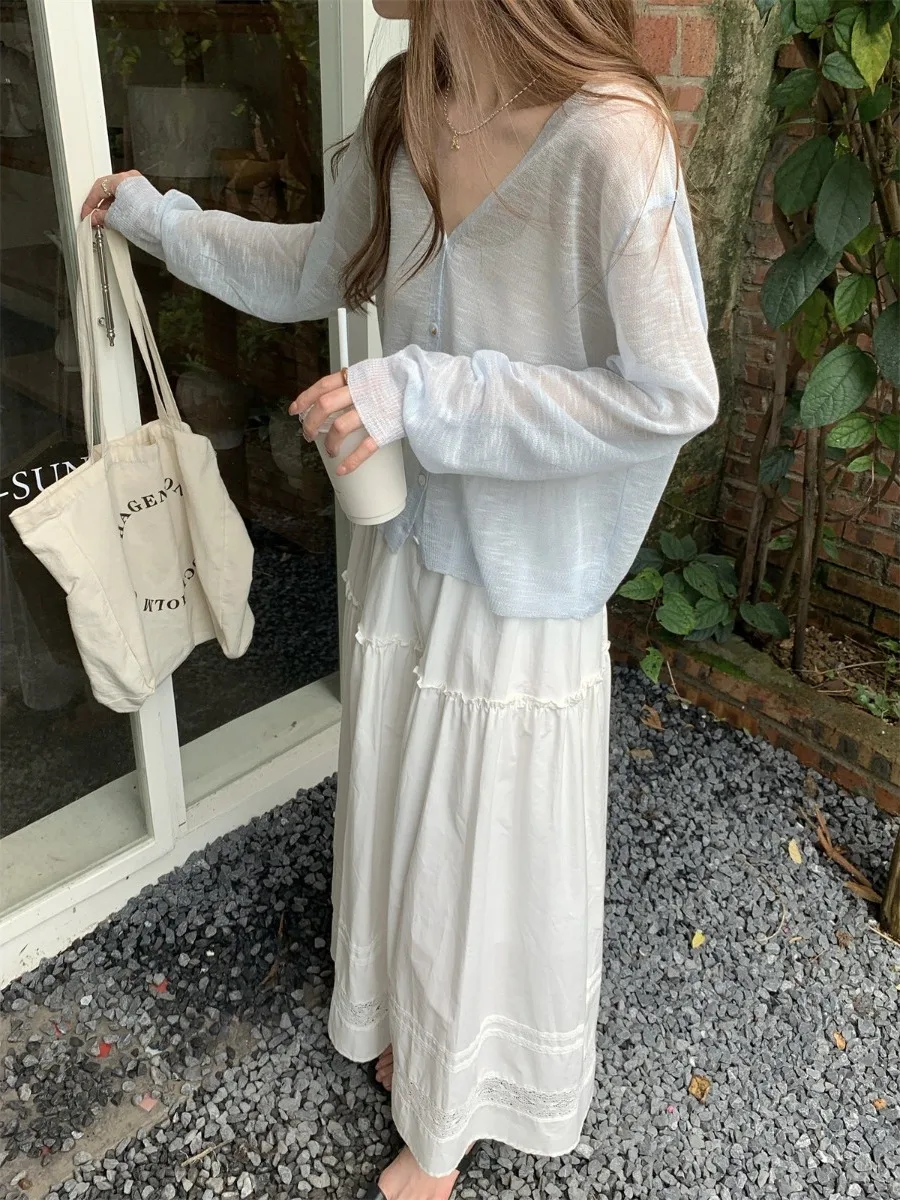 Summer New Ice Silk Knitted Air Conditioned Shoulder Shawl Thin Cardigan to Match Halter Dress Outer Cover Small Jacket
Summer New Ice Silk Knitted Air Conditioned Shoulder Shawl Thin Cardigan to Match Halter Dress Outer Cover Small Jacket