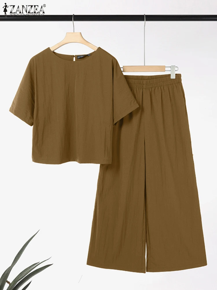 ZANZEA 2025 Summer Women Matching Sets Casual Outfits Vintage 2PCS Short Sleeve Blouse Solid Pant Sets Elegant Work OL Tracksuit
ZANZEA 2025 Summer Women Matching Sets Casual Outfits Vintage 2PCS Short Sleeve Blouse Solid Pant Sets Elegant Work OL Tracksuit