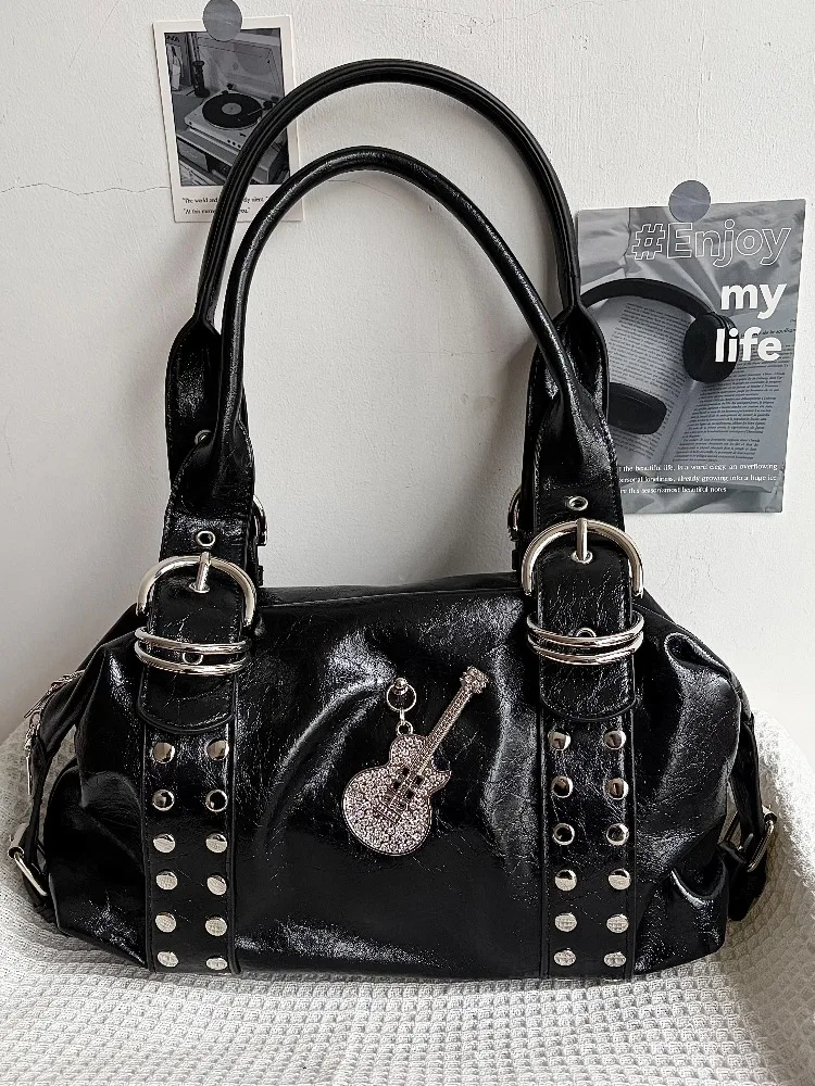 Original Y2k Rock Guitar Decor Tote Bag Locomotive Rivet Shoulder Bag for Women Portable Punk Goth Bag
Original Y2k Rock Guitar Decor Tote Bag Locomotive Rivet Shoulder Bag for Women Portable Punk Goth Bag