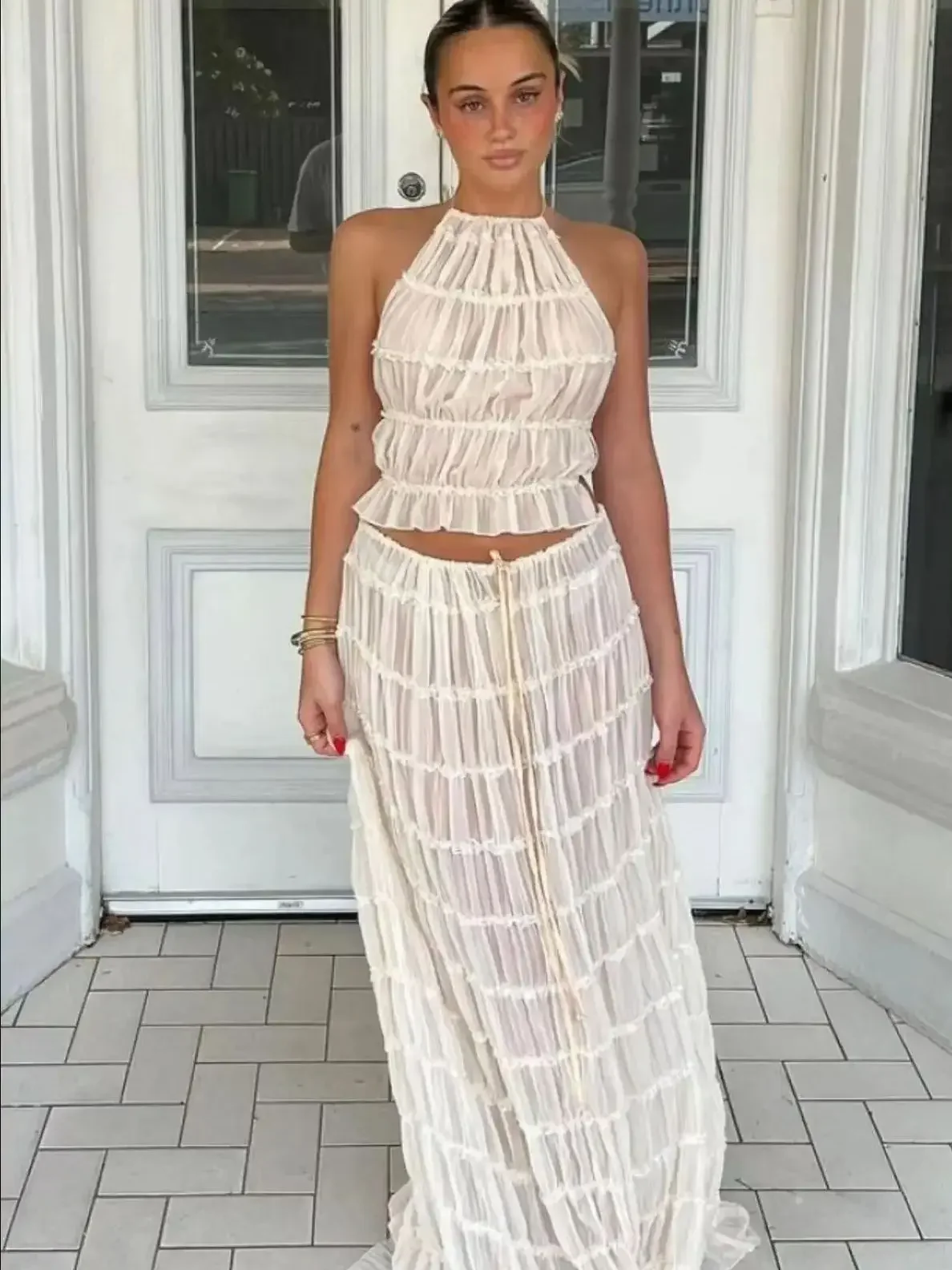 Fashion Halter Neck Long Skirt Suit Women Backless Sling Top Lace Up Fold Maxi Skirts 2025 New Summer Female 2 Piece Set Outfits
Fashion Halter Neck Long Skirt Suit Women Backless Sling Top Lace Up Fold Maxi Skirts 2025 New Summer Female 2 Piece Set Outfits
