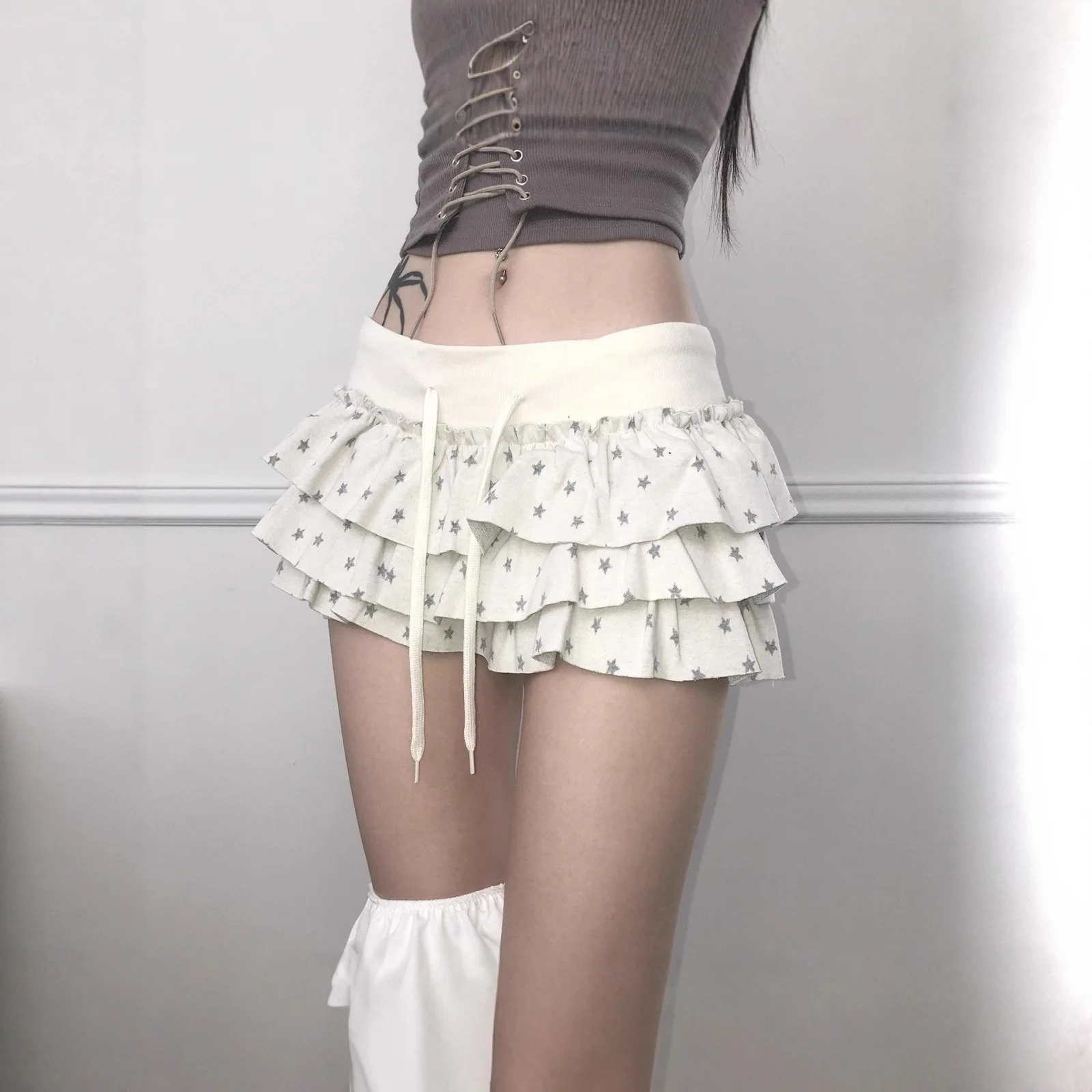 2026 Summer Star Printed Pleated Skirt Women Multi layer Ruffle Mini Skirt Elastic Waist Tie Sweet Cool Trendy Casual Short
2026 Summer Star Printed Pleated Skirt Women Multi layer Ruffle Mini Skirt Elastic Waist Tie Sweet Cool Trendy Casual Short