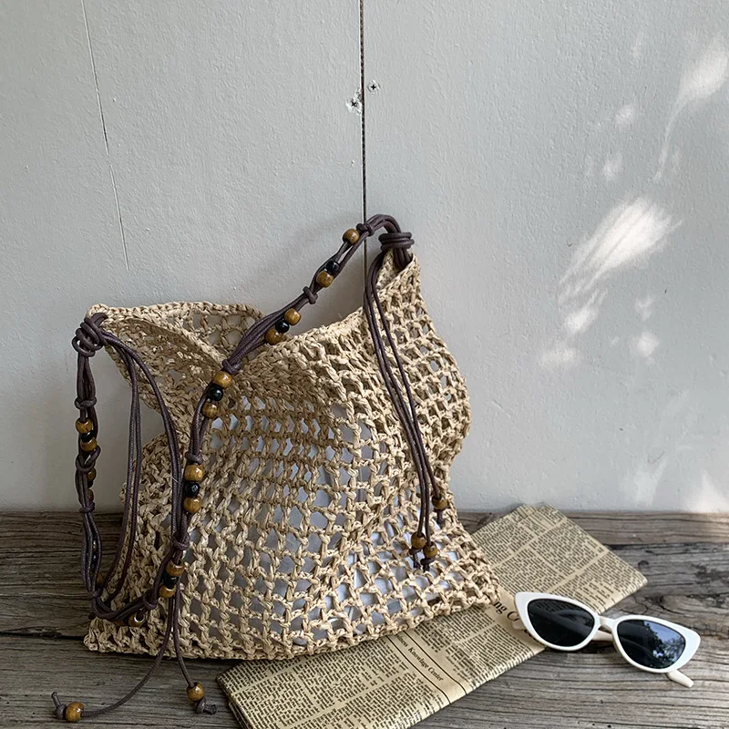 Summer New Bead Retro Underarm Shoulder Bags Casual Versatile Large Capacity Tote Bag Beach Vacation Grass Woven Women's Bag
Summer New Bead Retro Underarm Shoulder Bags Casual Versatile Large Capacity Tote Bag Beach Vacation Grass Woven Women's Bag