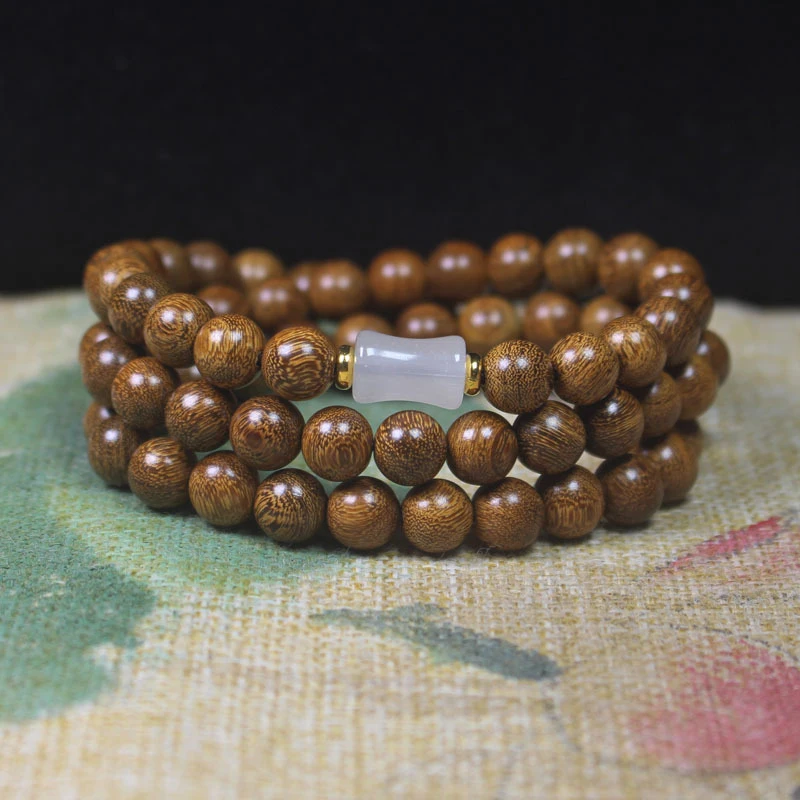 8mm Golden Sandalwood Three-Loop Buddhist with White Bamboo Joint Accessories, Simple and Elegant Bead Bracelet fo
8mm Golden Sandalwood Three-Loop Buddhist with White Bamboo Joint Accessories, Simple and Elegant Bead Bracelet fo