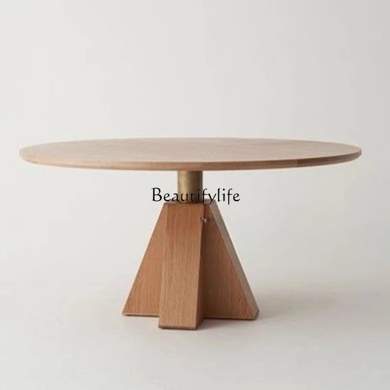 Retro simple wabi-sabi wind log round solid wood dining table
Retro simple wabi-sabi wind log round solid wood dining table