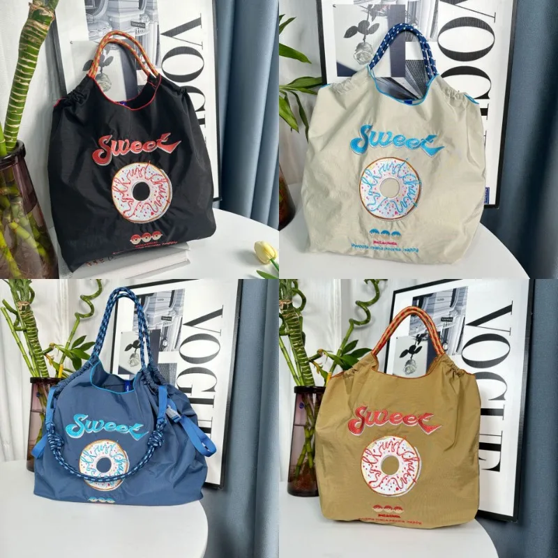 Ball Chain Cartoon Donut Embroidery Shopping Bag Large Capacity Nylon Eco Friendly Bag Handheld Single Shoulder Crossbody Bag
Ball Chain Cartoon Donut Embroidery Shopping Bag Large Capacity Nylon Eco Friendly Bag Handheld Single Shoulder Crossbody Bag