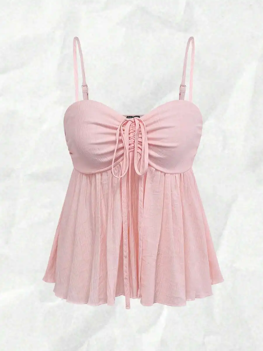 Pink Ruched Front Camisole with Adjustable Straps and Flowy Hem
Pink Ruched Front Camisole with Adjustable Straps and Flowy Hem
