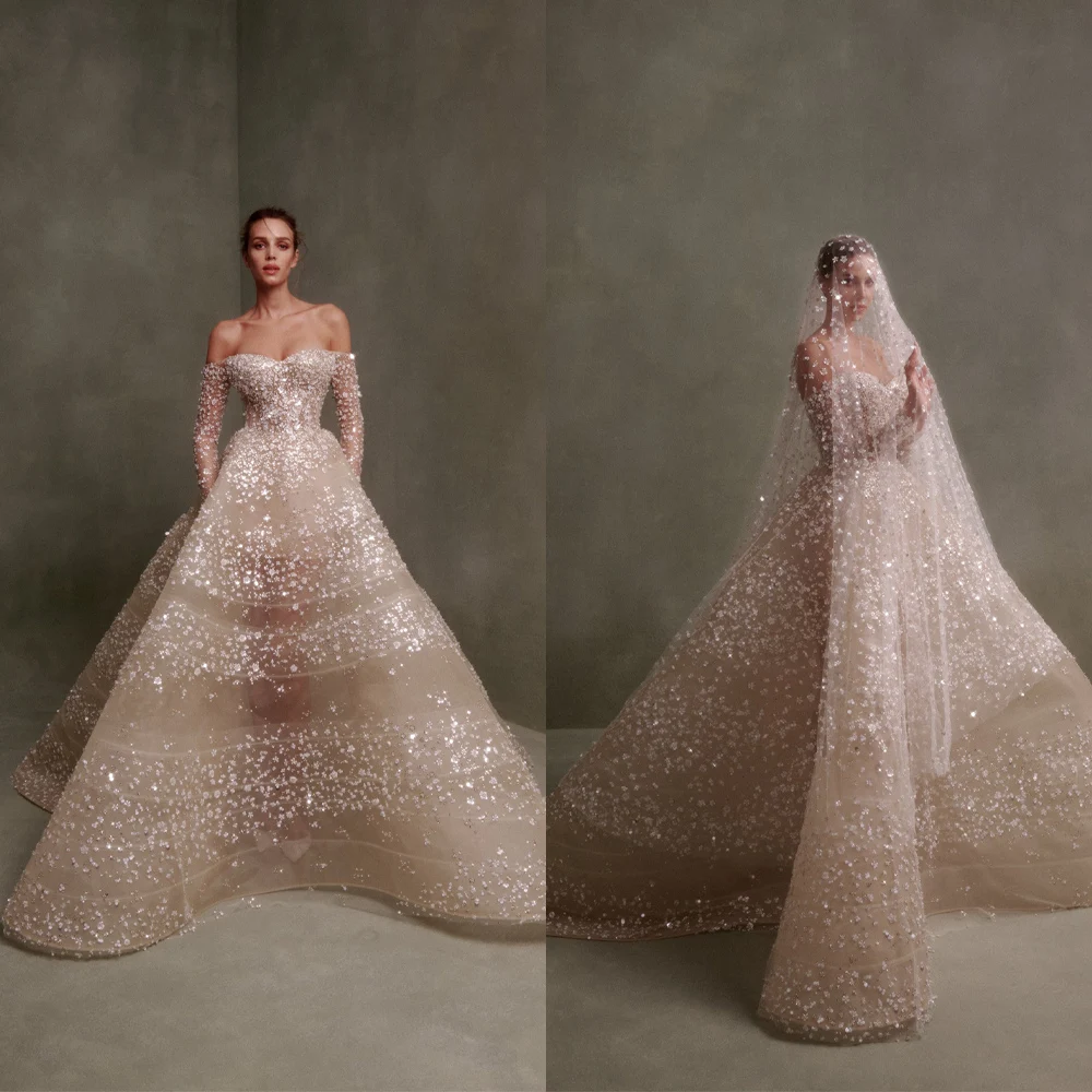 New Designer A-line Wedding Dress Champagne Off Shoulder Arabic Long Sleeves Sequins Beading Bridal Ball Gown Party Customized
New Designer A-line Wedding Dress Champagne Off Shoulder Arabic Long Sleeves Sequins Beading Bridal Ball Gown Party Customized