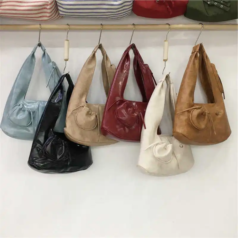 Niche Design Women PU Leather Shoulder Bags High-Grade Sense Red Handbag Cool Girl Daily Out Underarm Tote Bag
Niche Design Women PU Leather Shoulder Bags High-Grade Sense Red Handbag Cool Girl Daily Out Underarm Tote Bag