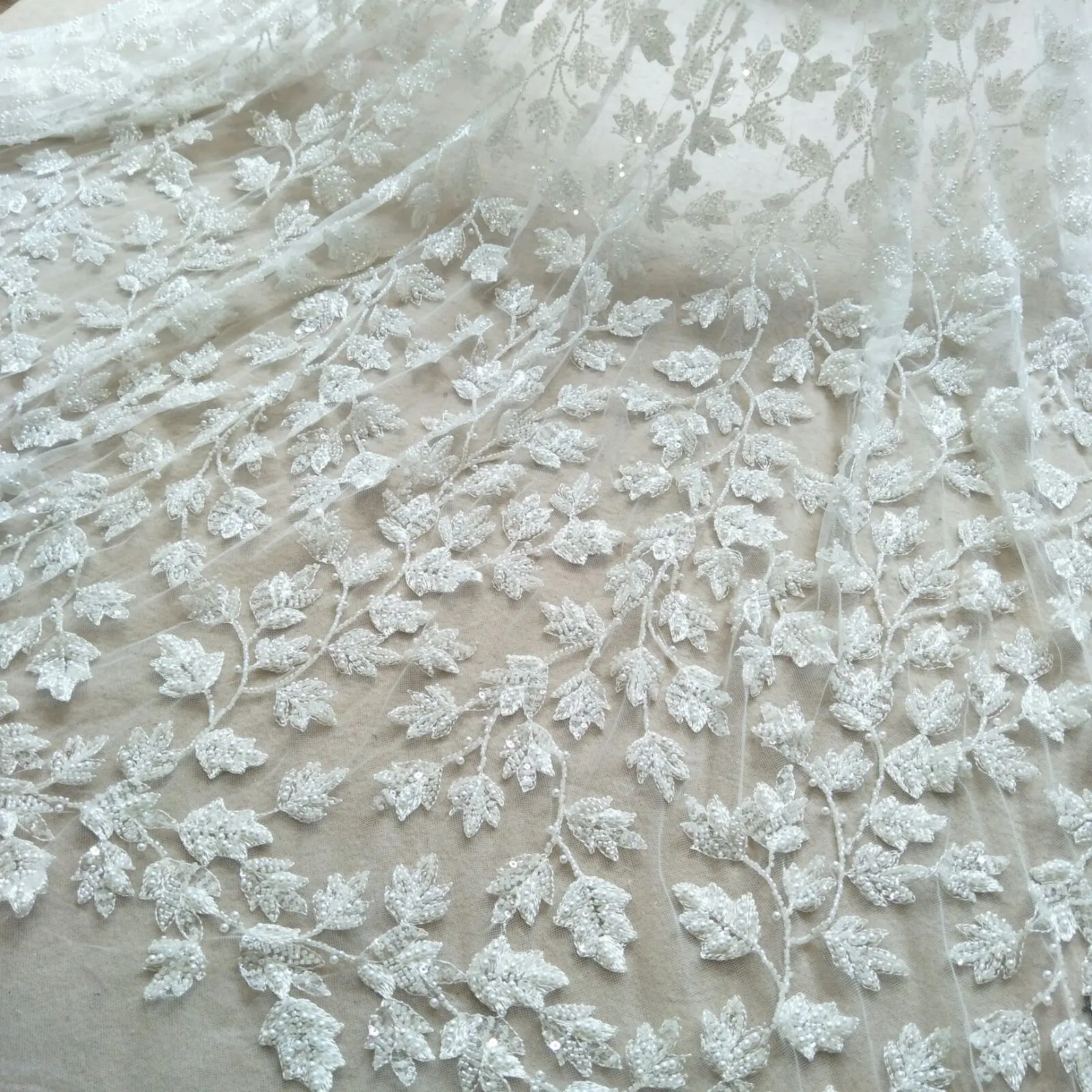 ivory beading leafs wedding gown dress lace fabric 130cm width lace sell by yard
ivory beading leafs wedding gown dress lace fabric 130cm width lace sell by yard