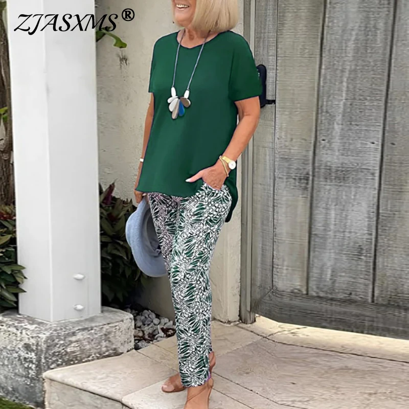 Simple Casual Solid T-shirt & Print Pant Sets Women Casual O Neck Short Sleeve Outfit 2025 Spring Summer Two Piece Suit Harajuku
Simple Casual Solid T-shirt & Print Pant Sets Women Casual O Neck Short Sleeve Outfit 2025 Spring Summer Two Piece Suit Harajuku