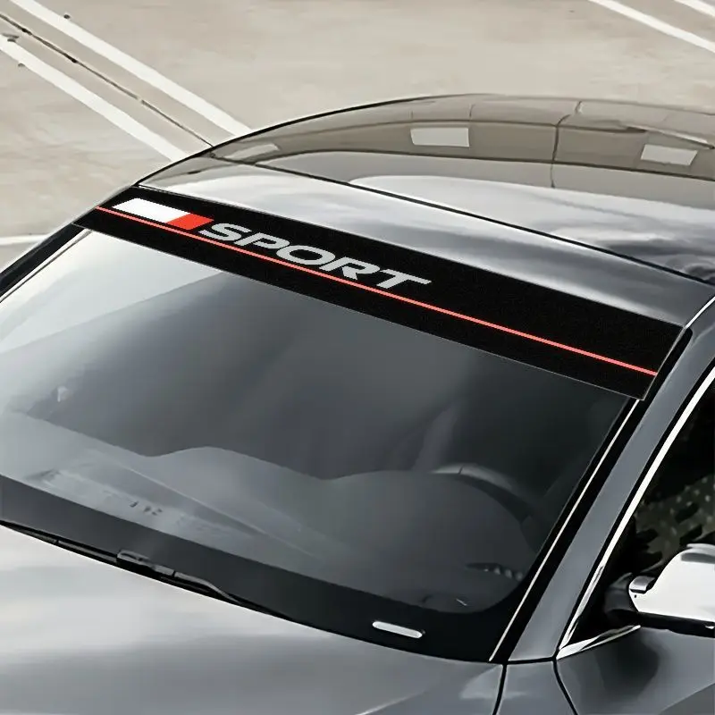A stylish car windshield sticker with a sports theme, highlighting the capital white letters "SPORT" against a black background
A stylish car windshield sticker with a sports theme, highlighting the capital white letters "SPORT" against a black background