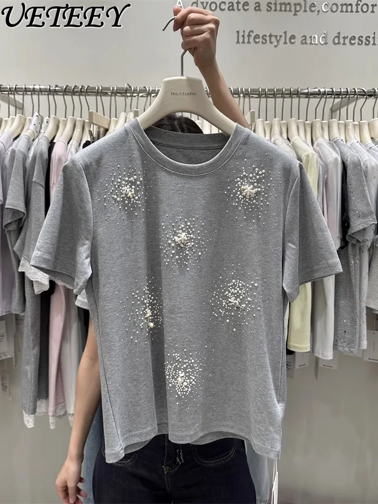 Cotton Short-sleeved T-shirt Women's 2025 Summer New Foreign Style Design T Shirt Pearl Heavy Industry Loose Age-reducing Top
Cotton Short-sleeved T-shirt Women's 2025 Summer New Foreign Style Design T Shirt Pearl Heavy Industry Loose Age-reducing Top