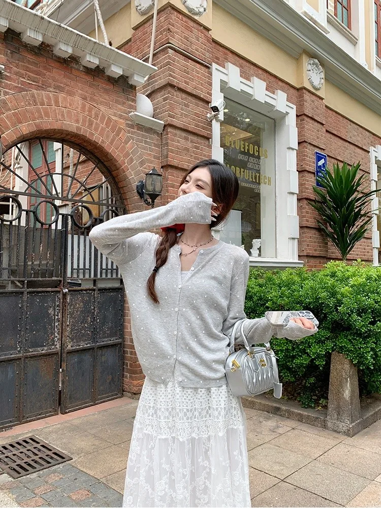 Вязаный комплект Yang Bubble с узором в горошек: летний женский новый комплект из вязаного топа на бретельках и кардигана, модный костюм из двух предметов
Вязаный комплект Yang Bubble с узором в горошек: летний женский новый комплект из вязаного топа на бретельках и кардигана, модный костюм из двух предметов