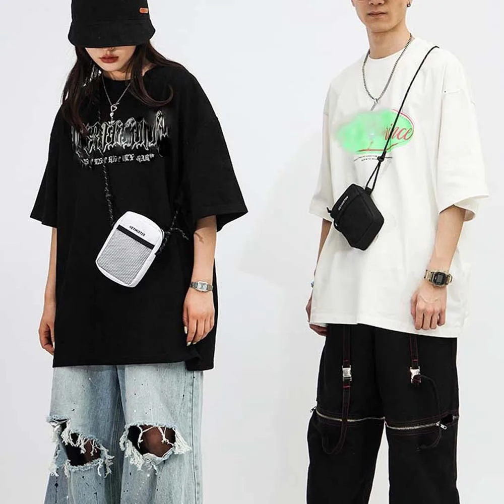 Oxford Cloth Men's Shoulder Bag Hollow Out Label Waist Pack with Carabiner Multi Functional Adjustable Strap Mini Square Bag
Oxford Cloth Men's Shoulder Bag Hollow Out Label Waist Pack with Carabiner Multi Functional Adjustable Strap Mini Square Bag