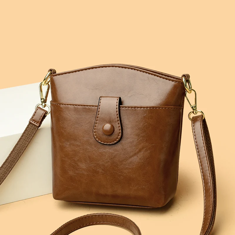 Новые роскошные однотонные сумки через плечо из искусственной кожи для телефона, простая женская сумка в стиле ретро, модная брендовая сумка на плечо, кошелек для монет
Новые роскошные однотонные сумки через плечо из искусственной кожи для телефона, простая женская сумка в стиле ретро, модная брендовая сумка на плечо, кошелек для монет