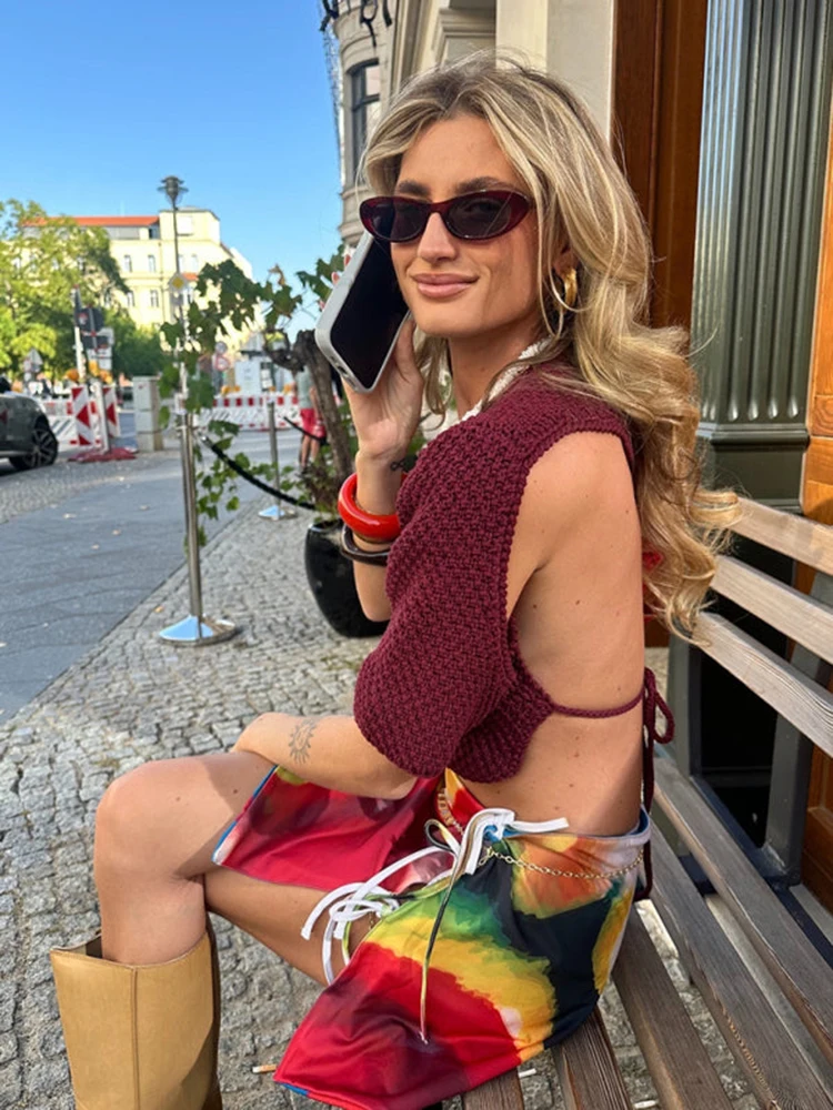 A vintage-inspired, elegant burgundy cropped backless lace-up knit top, perfect for casual vacation wear in spring, summer
A vintage-inspired, elegant burgundy cropped backless lace-up knit top, perfect for casual vacation wear in spring, summer