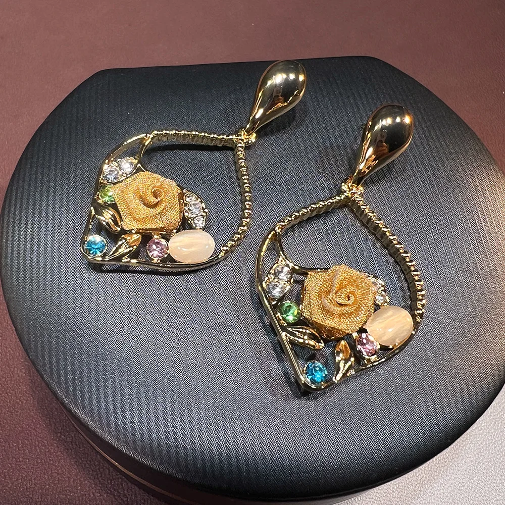 New Chinese style new three-dimensional flower opal plated real gold fashion flower elegant high sense light luxury S925 earring
New Chinese style new three-dimensional flower opal plated real gold fashion flower elegant high sense light luxury S925 earring