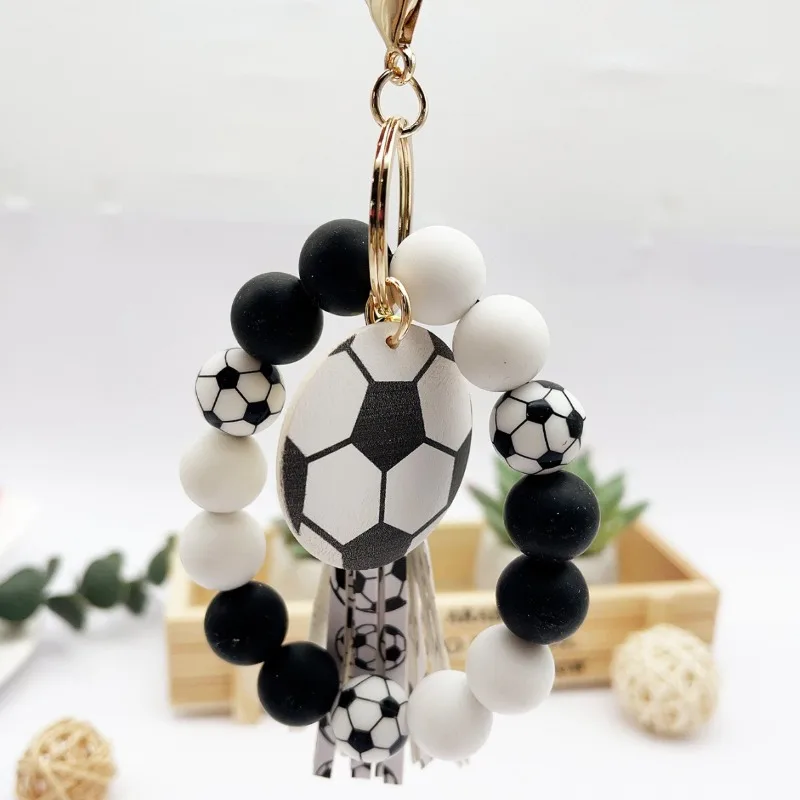 Sports Ball Silicone Beaded Tassel Wristlet Keychain Wooden Bead Ball Charm Bag Pendant Decoration Accessories
Sports Ball Silicone Beaded Tassel Wristlet Keychain Wooden Bead Ball Charm Bag Pendant Decoration Accessories