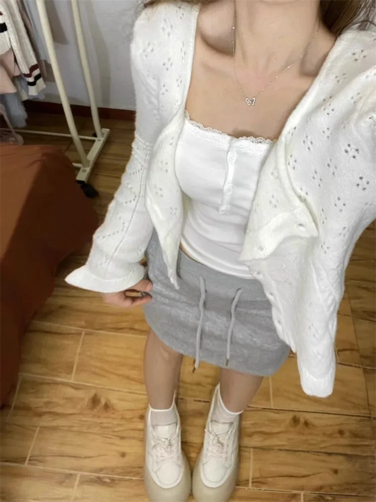 White Hollow out Knitted Cardigan Women's Early Autumn New Korean Sle Soft Outerwear Thin Outer Coat Top Button V-ne Long...
White Hollow out Knitted Cardigan Women's Early Autumn New Korean Sle Soft Outerwear Thin Outer Coat Top Button V-ne Long...