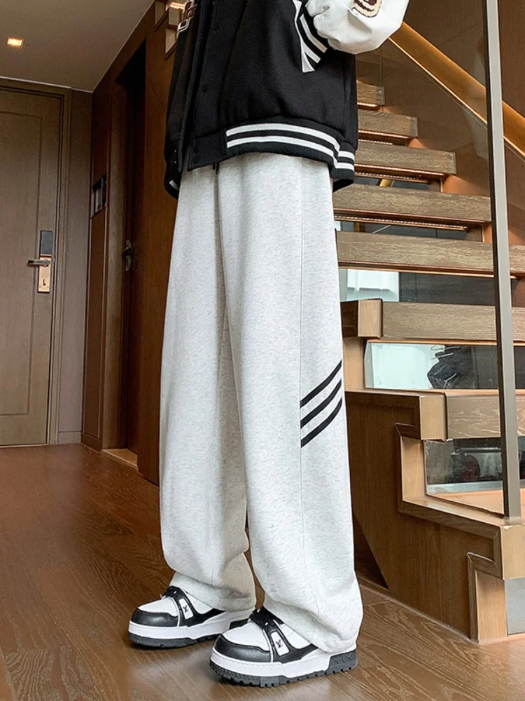 Мужские осенние тонкие свободные прямые брюки в полоску American Spor, широкие, струящиеся, в пол, с эффектным дизайном
Мужские осенние тонкие свободные прямые брюки в полоску American Spor, широкие, струящиеся, в пол, с эффектным дизайном