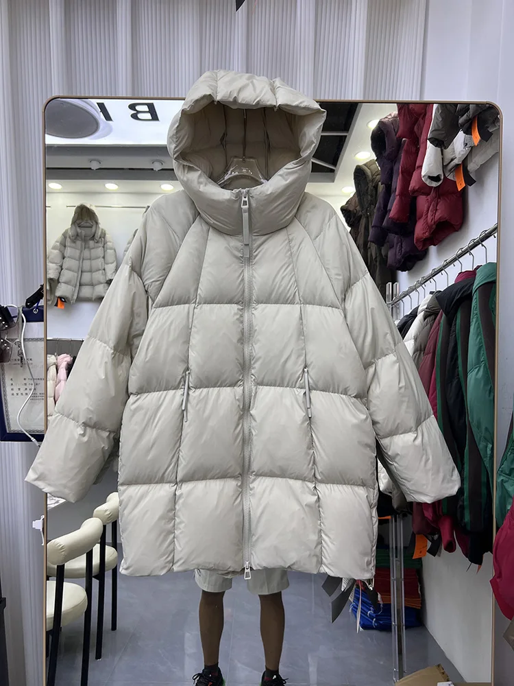 Down jacket women's long tofu block A-line version hooded 2025 women winter new fashion loose white duck down jacket
Down jacket women's long tofu block A-line version hooded 2025 women winter new fashion loose white duck down jacket