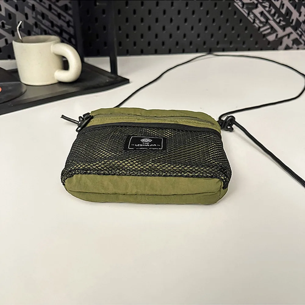 Portable Multifunctional Crossbody Phone Pouch Mesh Korean Style Nylon Shoulder Bag Handbag Solid Color Small Square Bag Man
Portable Multifunctional Crossbody Phone Pouch Mesh Korean Style Nylon Shoulder Bag Handbag Solid Color Small Square Bag Man