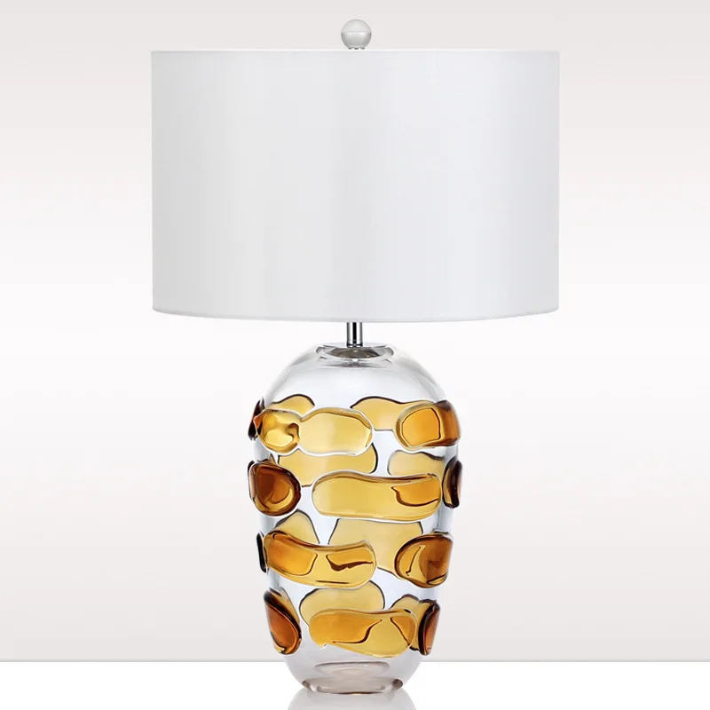 Glazed table lamp, simple modern living room bedroom bedside lamp, crystal glass light luxury post-American model room hotel
Glazed table lamp, simple modern living room bedroom bedside lamp, crystal glass light luxury post-American model room hotel