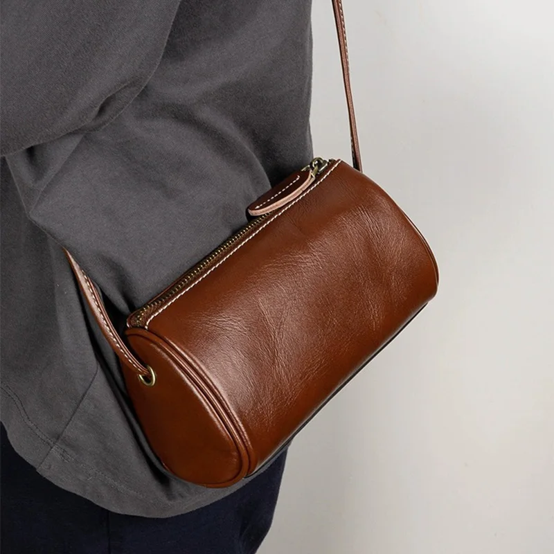 Cylinder Shaped Genuine Leather Bag Minimalist Design Casual Sling Purse Single Shoulder Strap Fashionable Crossbody Accessory
Cylinder Shaped Genuine Leather Bag Minimalist Design Casual Sling Purse Single Shoulder Strap Fashionable Crossbody Accessory