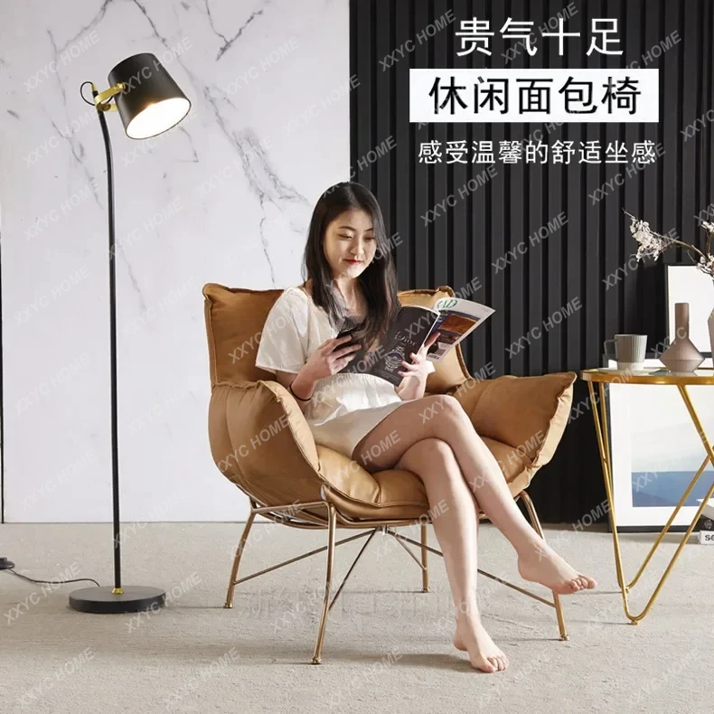 Nordic single sofa simple leather chair living room balcony bread chair golden legs 
Nordic single sofa simple leather chair living room balcony bread chair golden legs