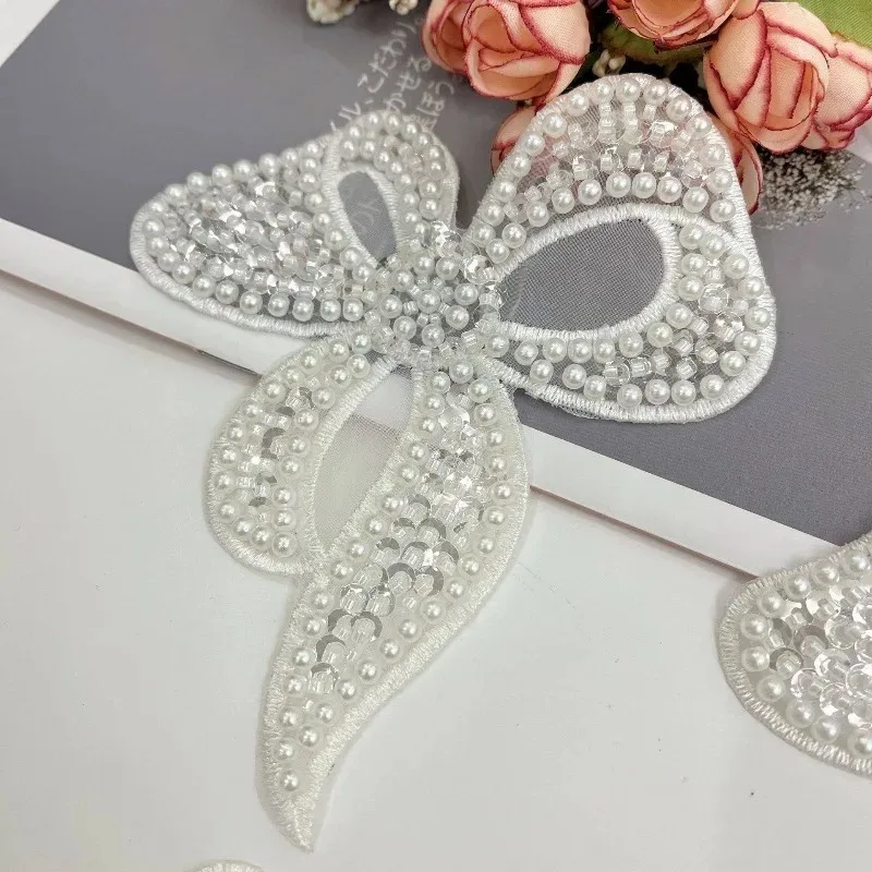 Новая Изысканная Бантиковая Заколка, Ткань с Жемчужной Вышивкой, Для Рукоделия, Свадебных Платьев, Детской Одежды, Декоративные Аксессуары
Новая Изысканная Бантиковая Заколка, Ткань с Жемчужной Вышивкой, Для Рукоделия, Свадебных Платьев, Детской Одежды, Декоративные Аксессуары