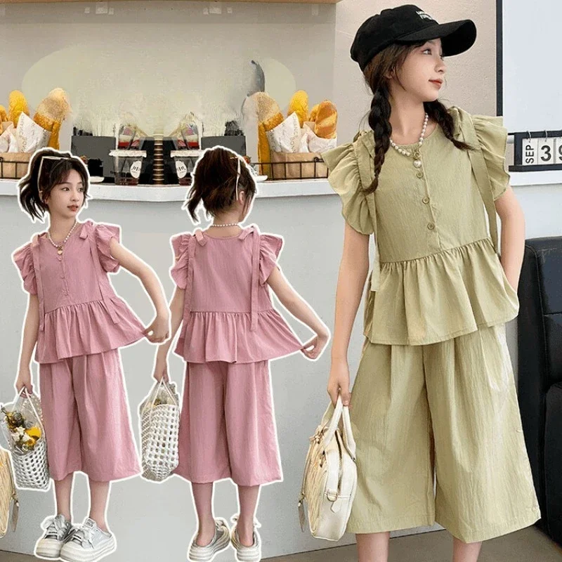 Летние комплекты для девочек, детская блузка без рукавов + широкие брюки, комплект из 2 предметов, свободный однотонный комплект для подростков, новая детская повседневная одежда, От 4 до 12 лет
Летние комплекты для девочек, детская блузка без рукавов + широкие брюки, комплект из 2 предметов, свободный однотонный комплект для подростков, новая детская повседневная одежда, От 4 до 12 лет
