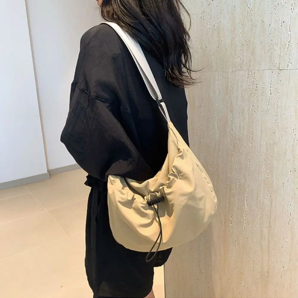 Solid Color Nylon Shoulder Bag Adjustable Shoulder Straps Korean Style Drawstring Bucket Bag School Bag Tote Bag
Solid Color Nylon Shoulder Bag Adjustable Shoulder Straps Korean Style Drawstring Bucket Bag School Bag Tote Bag