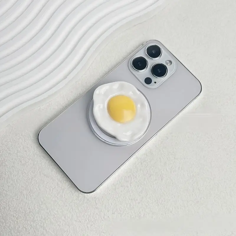 Magnetic Attraction Faux Fried Egg Sunny Side Up Phone Grip Folding Expandable Socket Bracket Grip Tok Lazy Stand SJZJ08
Magnetic Attraction Faux Fried Egg Sunny Side Up Phone Grip Folding Expandable Socket Bracket Grip Tok Lazy Stand SJZJ08