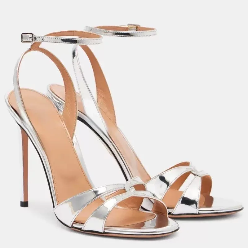Женские босоножки с открытым носком на ремешках, новинка лета 2026, из серебристой лакированной кожи, сексуальные и элегантные, на шпильке, удобные
Женские босоножки с открытым носком на ремешках, новинка лета 2026, из серебристой лакированной кожи, сексуальные и элегантные, на шпильке, удобные