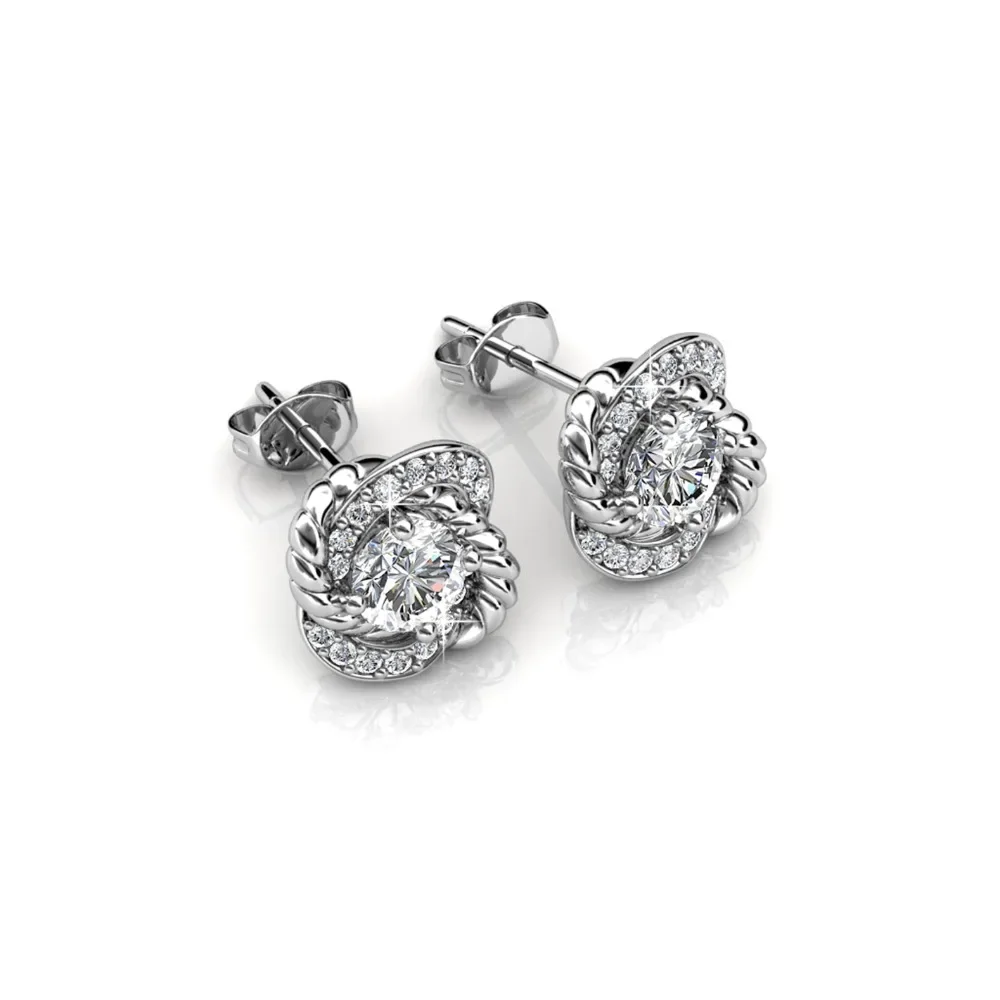 Daisini Роскошные серьги-гвоздики с поворотным дизайном, украшенные кристаллами Сваровски, сверкающие серьги-гвоздики, модные вечерние повседневные украшения
Daisini Роскошные серьги-гвоздики с поворотным дизайном, украшенные кристаллами Сваровски, сверкающие серьги-гвоздики, модные вечерние повседневные украшения