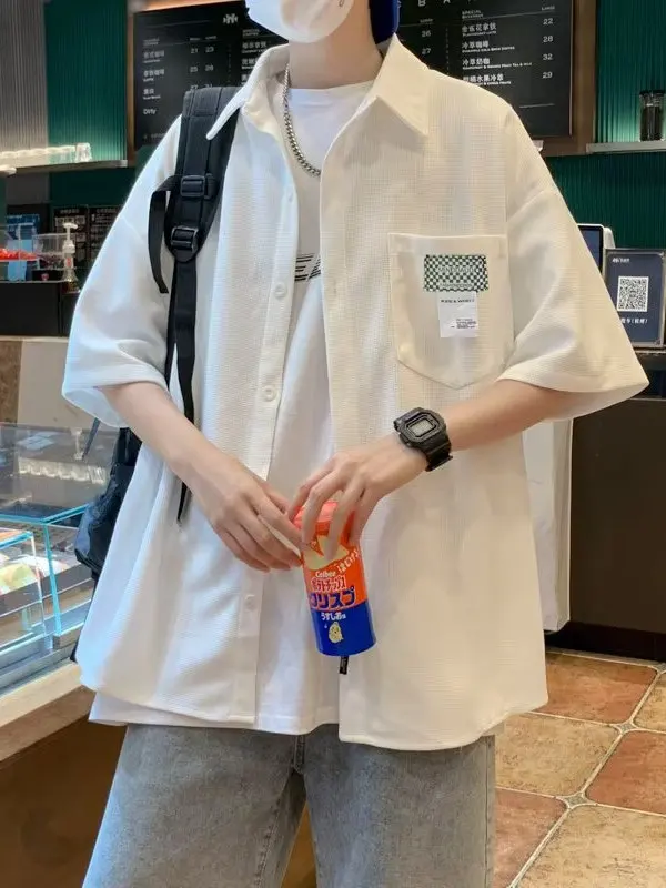 Летняя повседневная рубашка свободного кроя для мужчин из дышащей комфортной ткани в клетку, с отложным воротником, в стиле Гонконг
Летняя повседневная рубашка свободного кроя для мужчин из дышащей комфортной ткани в клетку, с отложным воротником, в стиле Гонконг