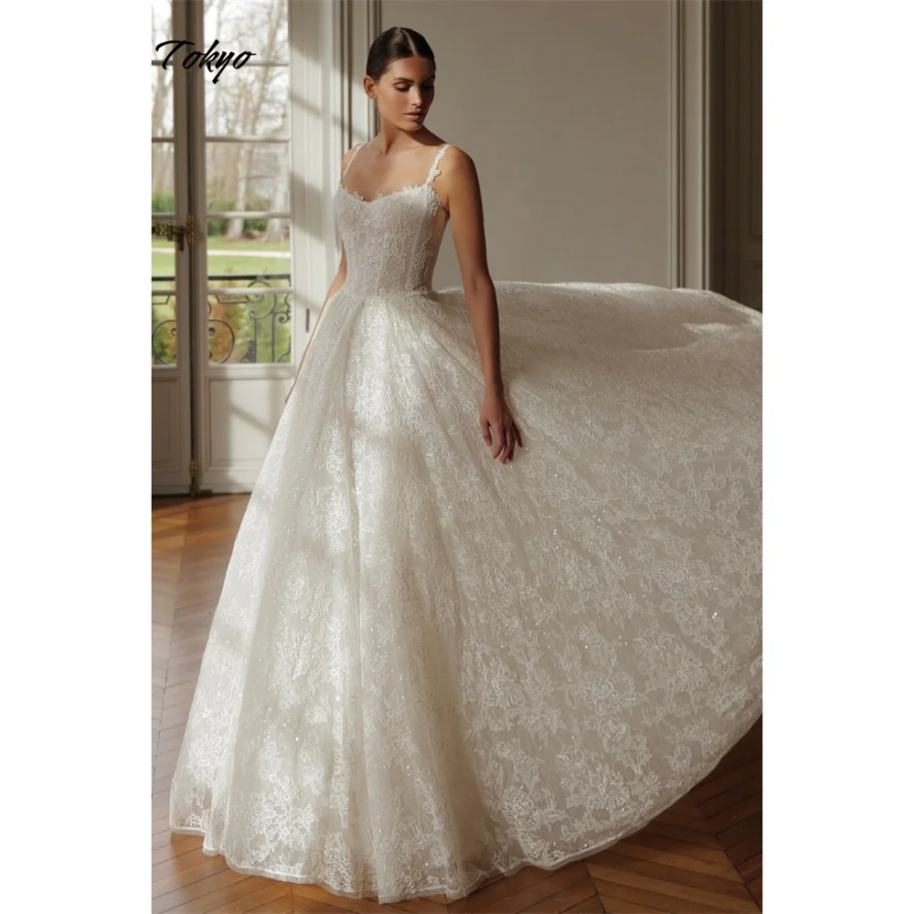 Tokyo Customized White Spaghetti Strap Wedding Dresses Sleeveless Lace A-Line Bridal Gowns Elegant Court Train Wedding Gowns
Tokyo Customized White Spaghetti Strap Wedding Dresses Sleeveless Lace A-Line Bridal Gowns Elegant Court Train Wedding Gowns