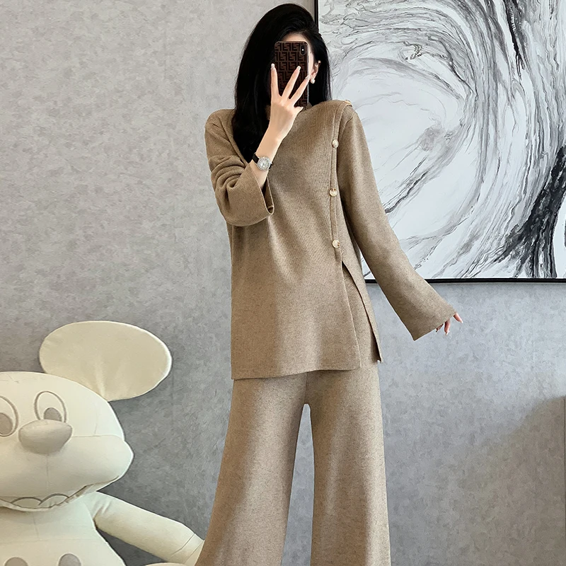 Winter Turtleneck Warm Thick Sweater 2 Piece Set Casual Women Solid Knitted Split Buttons Loose Pullovers + Wide-Leg Pants Suit
Winter Turtleneck Warm Thick Sweater 2 Piece Set Casual Women Solid Knitted Split Buttons Loose Pullovers + Wide-Leg Pants Suit
