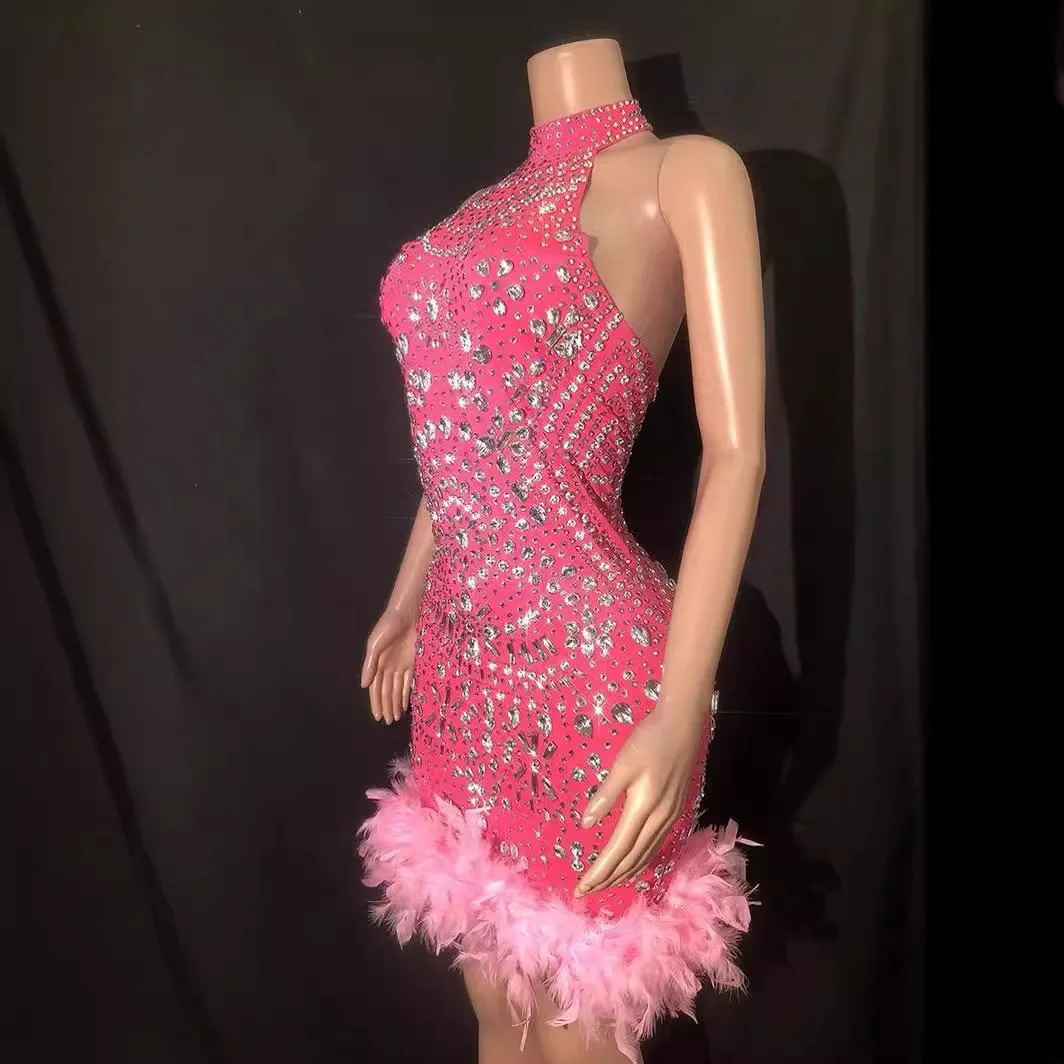 Super pink fine flash rhinestone neck sling backless sexy miniskirt skirt feather stage performance suit
Super pink fine flash rhinestone neck sling backless sexy miniskirt skirt feather stage performance suit