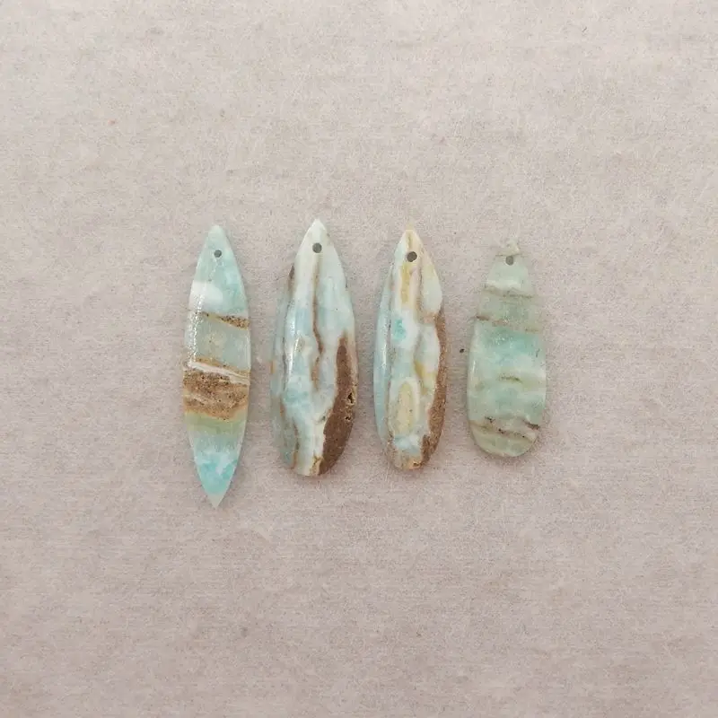 Набор драгоценных камней гемиморфитовой каплевидной формы с бирюзовыми и землистыми узорами для ремесленных ювелирных изделий и дизайнов в стиле бохо 35x12x4 мм-8,7 г
Набор драгоценных камней гемиморфитовой каплевидной формы с бирюзовыми и землистыми узорами для ремесленных ювелирных изделий и дизайнов в стиле бохо 35x12x4 мм-8,7 г