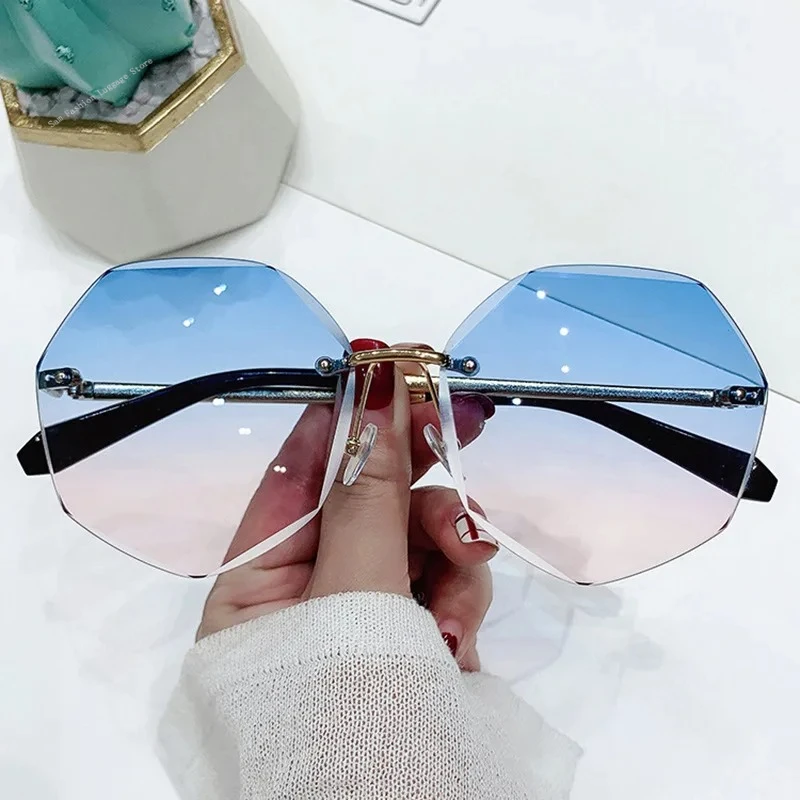 Octagonal Rimless Sunglasses Women's Retro Metallic Sun Glasses UV Protection New Fashion Cutting Lens Eyewear UV400 Sun Glasses
Octagonal Rimless Sunglasses Women's Retro Metallic Sun Glasses UV Protection New Fashion Cutting Lens Eyewear UV400 Sun Glasses