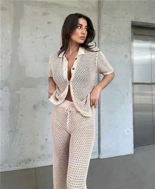 Fashion Hollow Knitted Two Piece Set Loose Short Sleeved Single Breasted Cardigan High Waisted Strap Wide Leg Pants Set Women
Fashion Hollow Knitted Two Piece Set Loose Short Sleeved Single Breasted Cardigan High Waisted Strap Wide Leg Pants Set Women