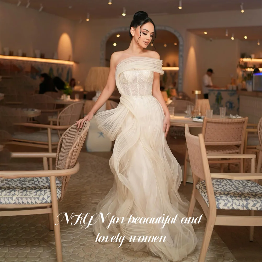 NFYN Beige Prom Dresses One Shoulder Short Sleeve Gala Dress Wrap Hips Saudi Arabic Flowing Evening Party Gown Customized
NFYN Beige Prom Dresses One Shoulder Short Sleeve Gala Dress Wrap Hips Saudi Arabic Flowing Evening Party Gown Customized