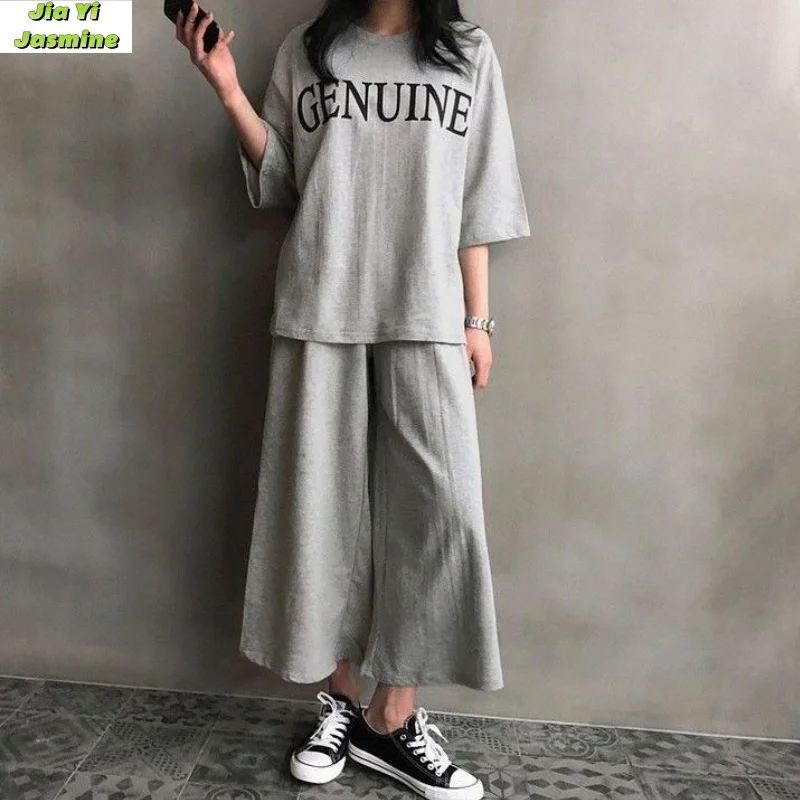 Women's Summer Letter Loose Short Sleeve T-shirt Two Piece Set Wide Leg Pants Casual Sports Set
Women's Summer Letter Loose Short Sleeve T-shirt Two Piece Set Wide Leg Pants Casual Sports Set